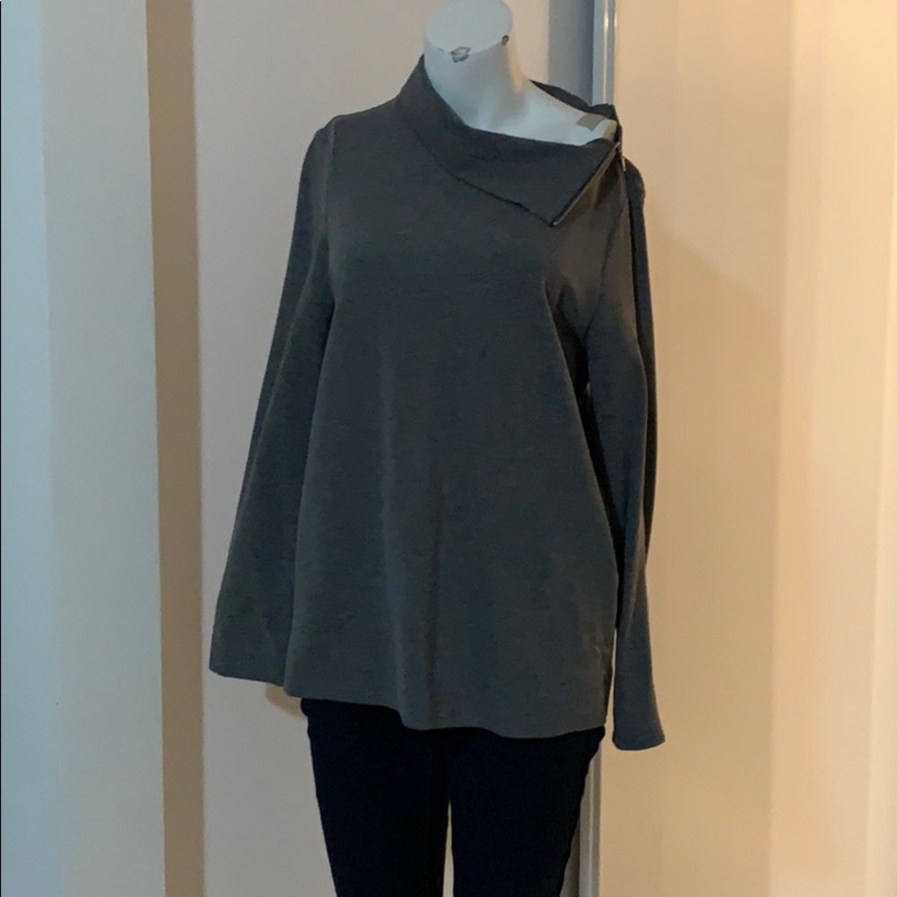 COS sweater with a zipper around collar